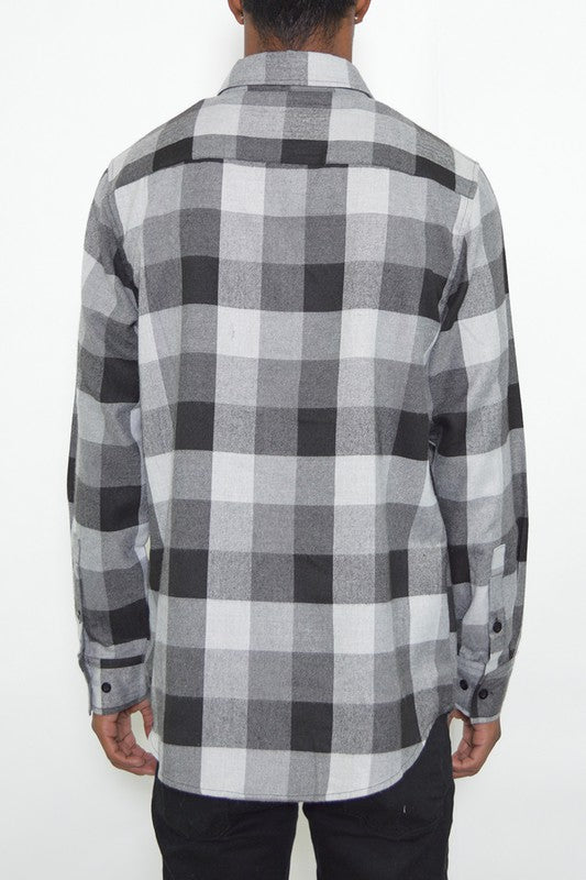 Weiv Long Sleeve Checkered Flannel shirt featuring a classic checkered pattern, chest pockets, and a curved hem design.