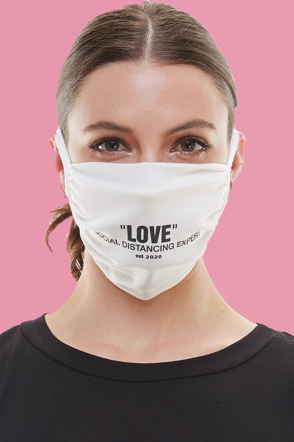 White adjustable tie face mask made of washable cotton fabric, featuring four tie-up straps and an inner pocket for filters.