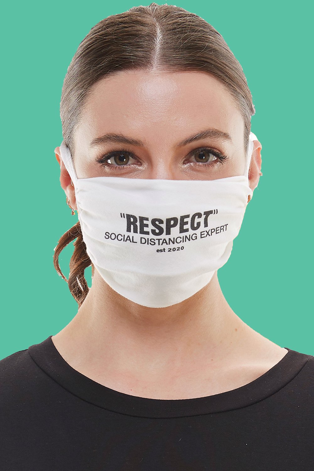 White adjustable tie face mask made of washable cotton fabric, featuring four tie-up straps and an inner pocket for filters.