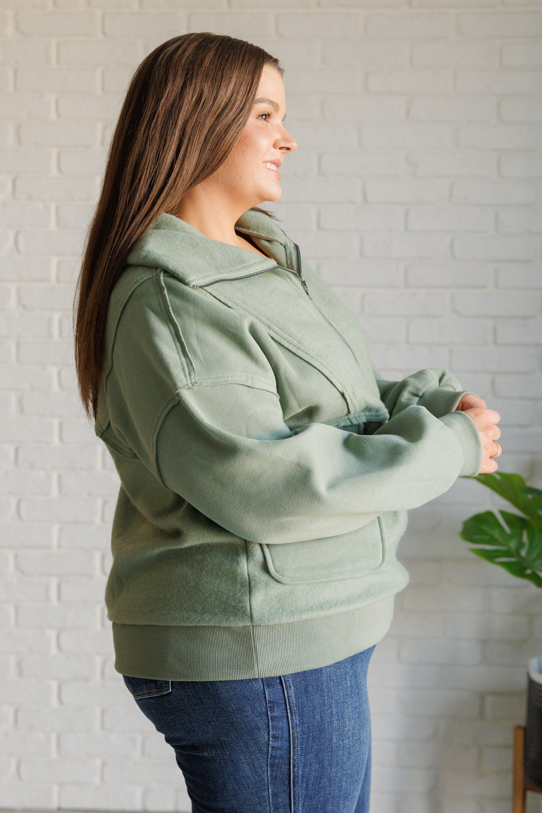 A stylish Winter is Coming Fleece Collared Pullover featuring a wide collar, half zipper, and snap closure patch pockets, perfect for winter wear.