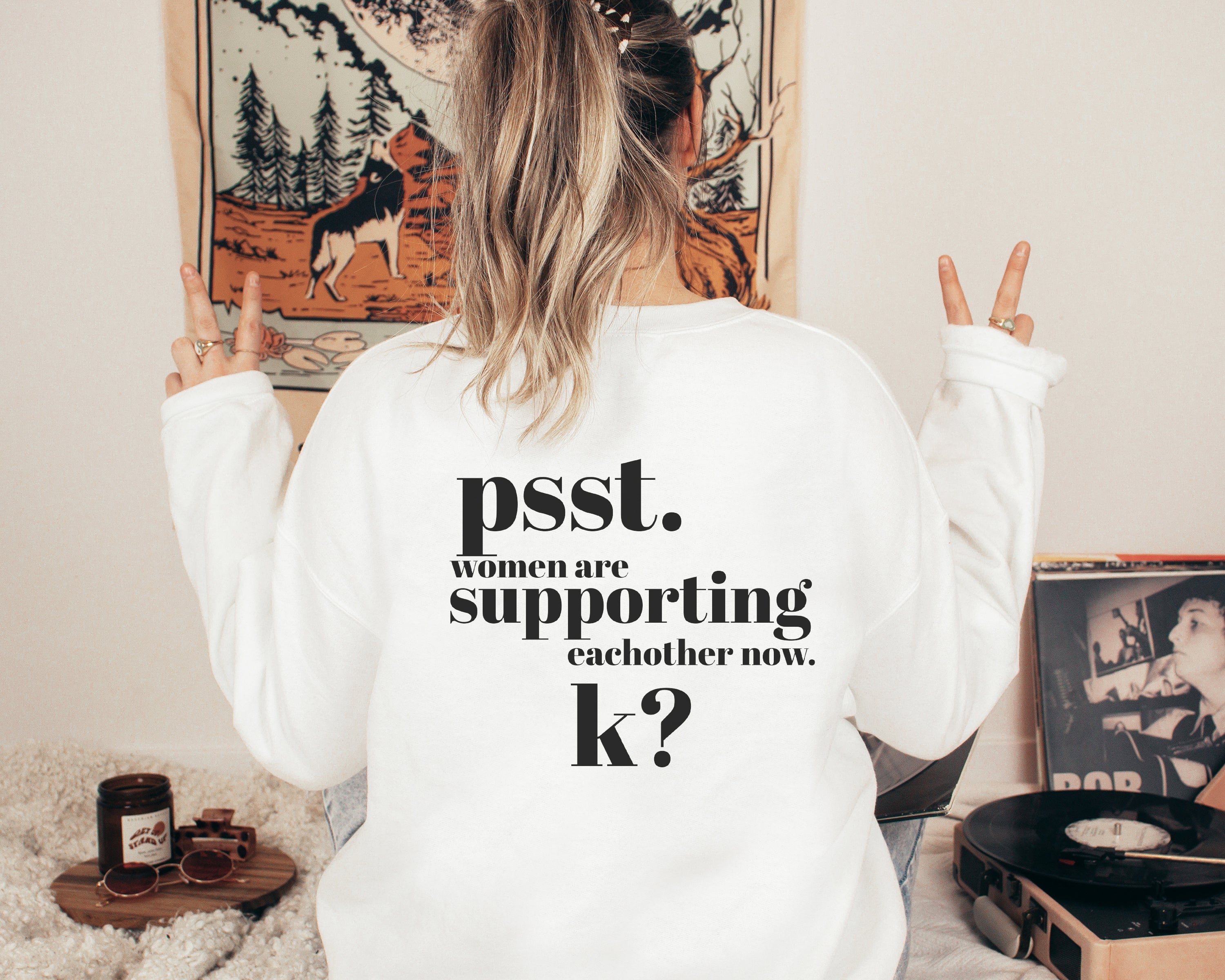 Women Are Supporting Eachother Now Unisex Pullover in various colors, showcasing its soft fabric and classic fit.