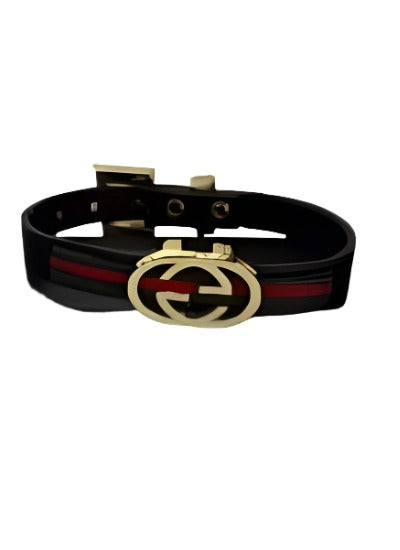 Elegant Gucci Women Bracelet made of genuine leather in gold and black colors, showcasing a stylish design.