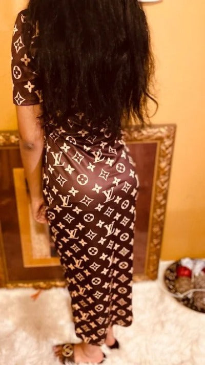 A stylish women fashion long dress with short sleeves, perfect for various occasions, showcasing its elegant design and comfortable fit.