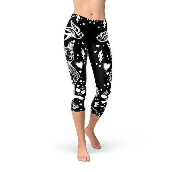 Womens Black Magic Cat Capri Leggings featuring unique graphic design, perfect for workouts and casual wear.