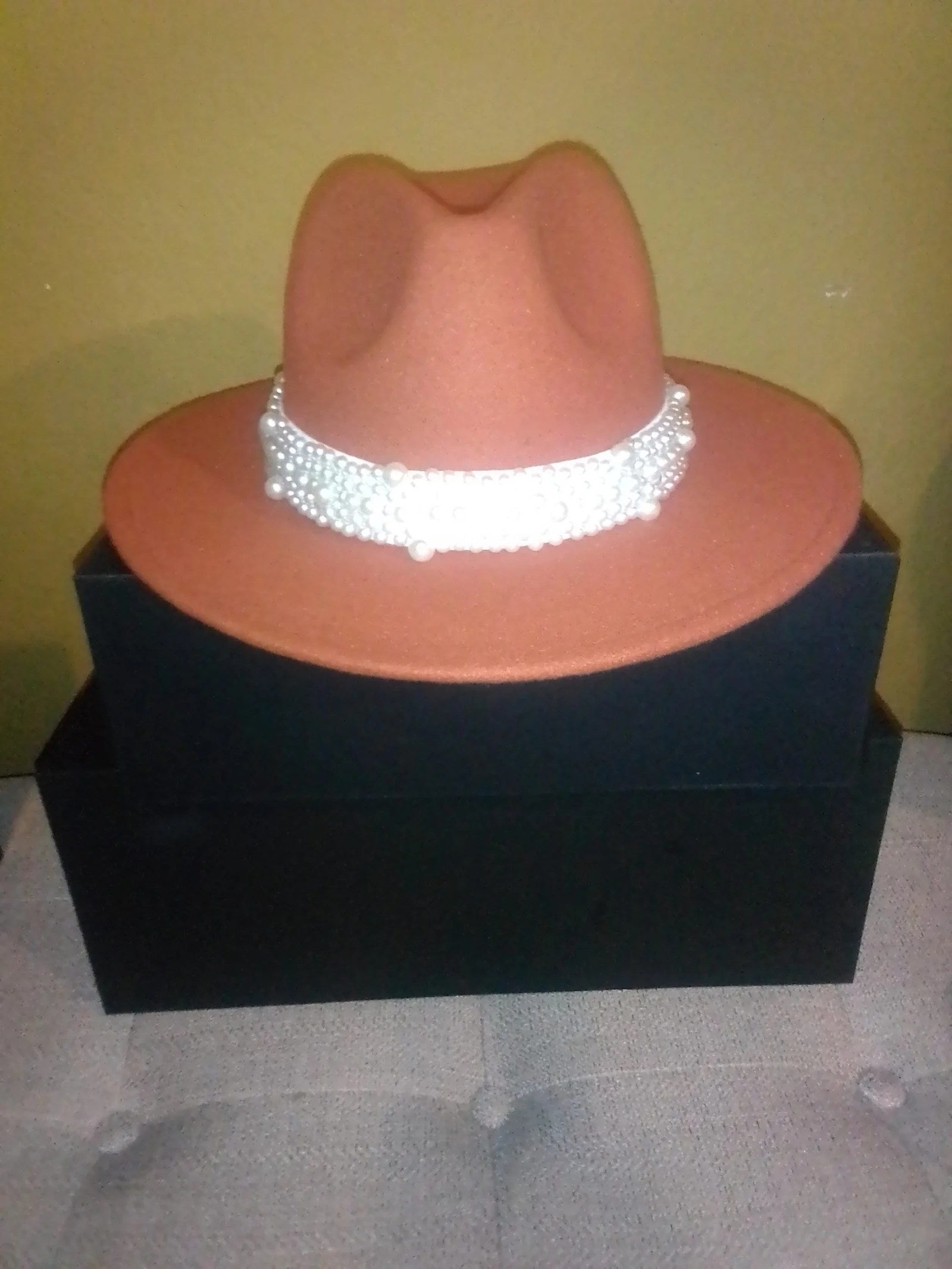 Women's Brim Wool Ranger Hat in various colors with a leather pearl ribbon, showcasing its stylish design and quality material.