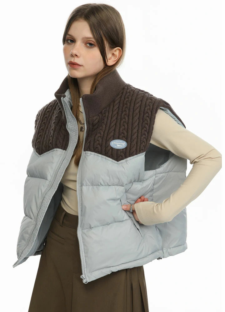 Women's ColorBlock Puffer Jacket Vest in stylish design with warm stand collar and adjustable hem.