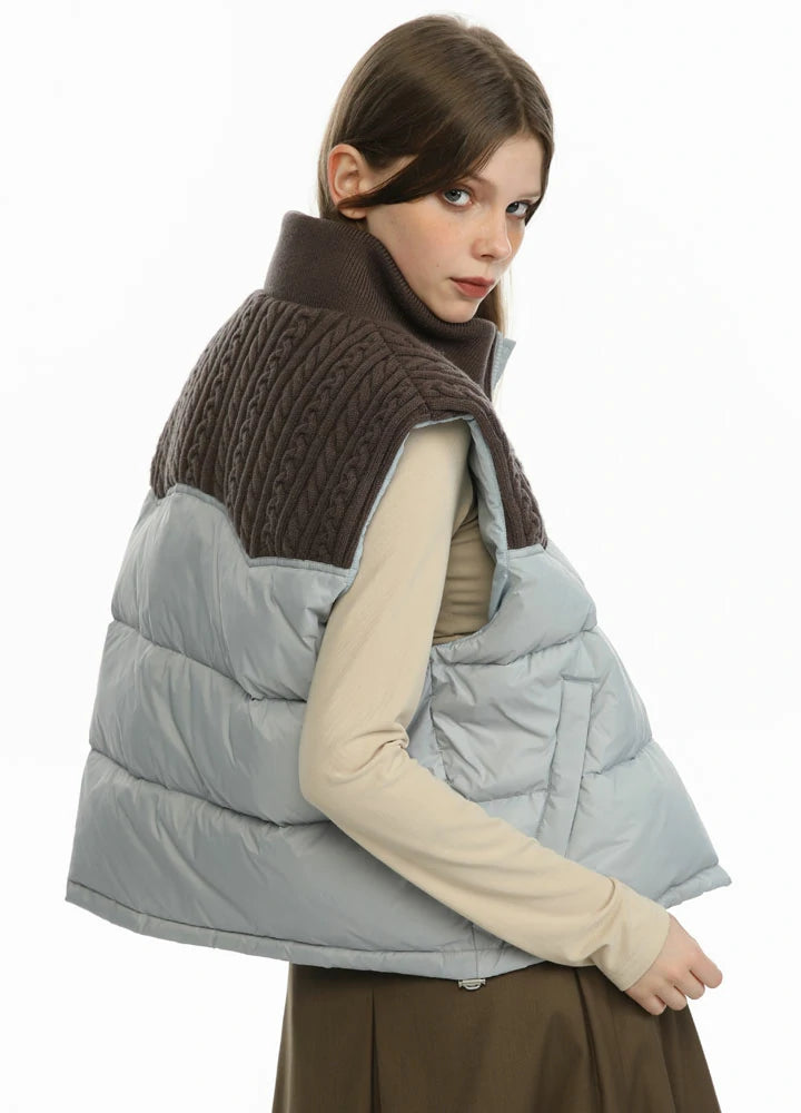 Women's ColorBlock Puffer Jacket Vest in stylish design with warm stand collar and adjustable hem.