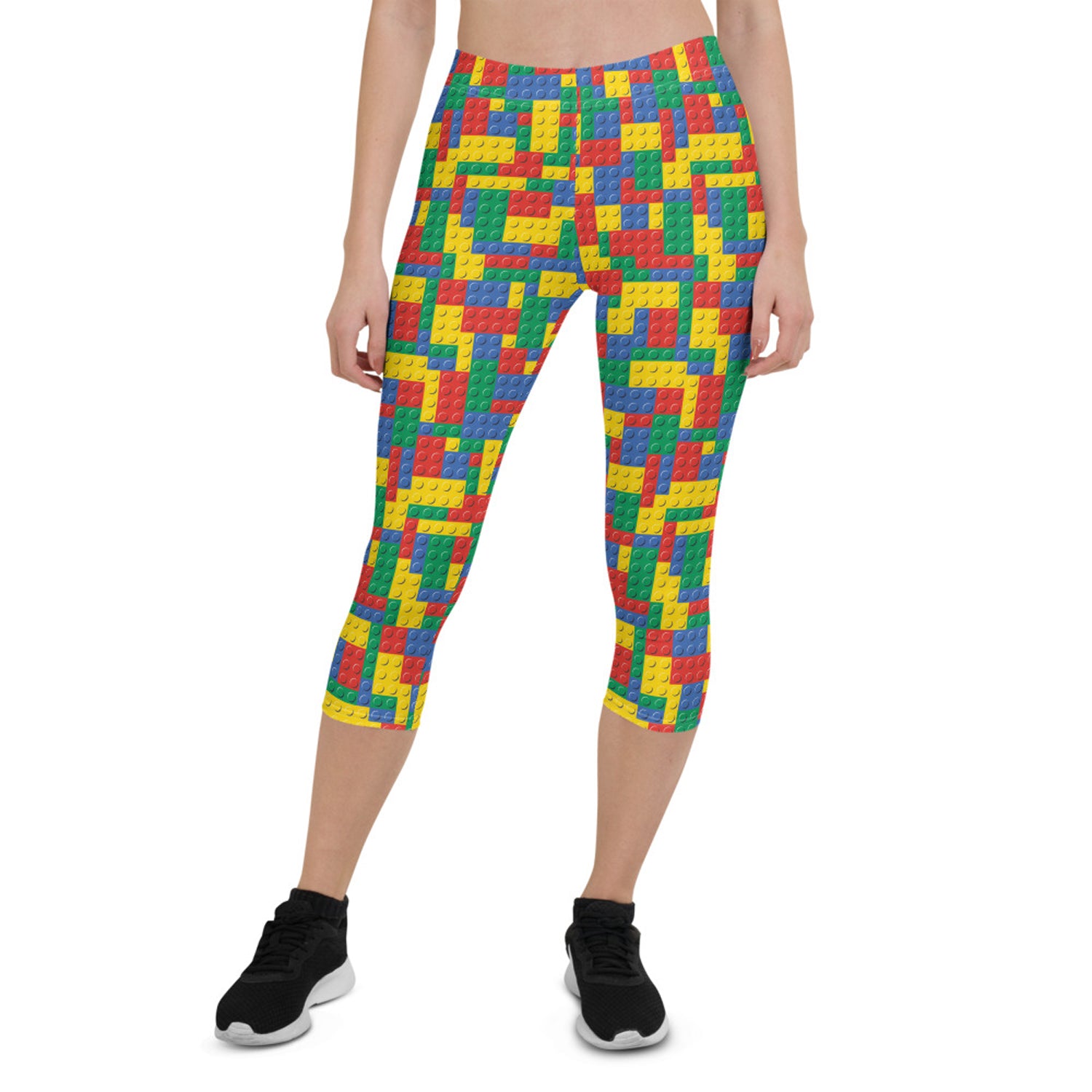 A pair of Women's Colorful Building Blocks Capri Leggings featuring vibrant, unique graphic designs, perfect for workouts and casual wear.