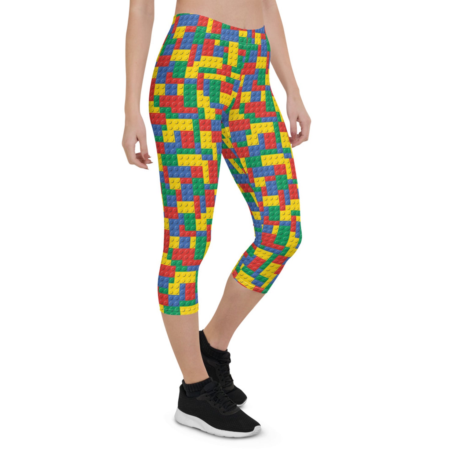 A pair of Women's Colorful Building Blocks Capri Leggings featuring vibrant, unique graphic designs, perfect for workouts and casual wear.