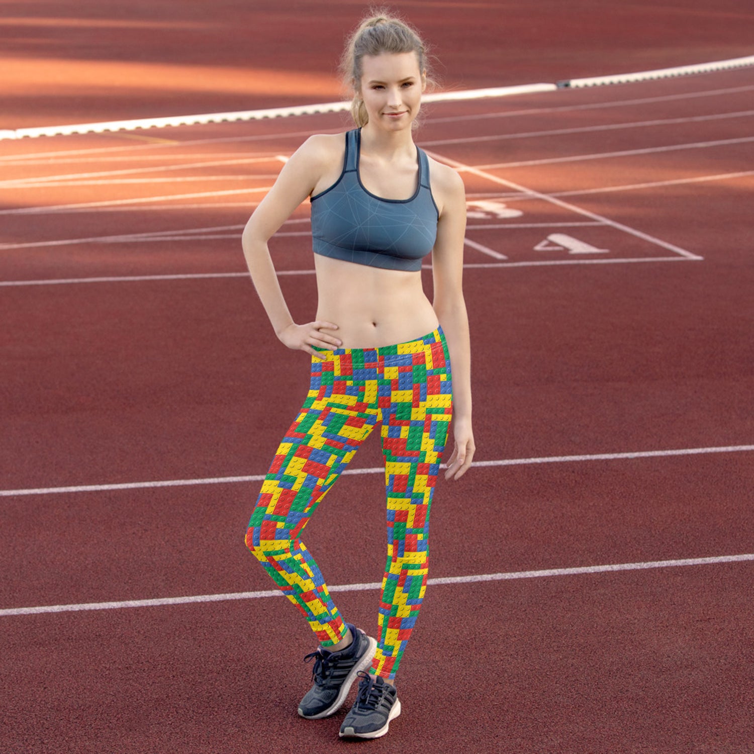 A pair of Womens Colorful Building Blocks Leggings featuring vibrant colors and unique patterns, designed for comfort and performance.