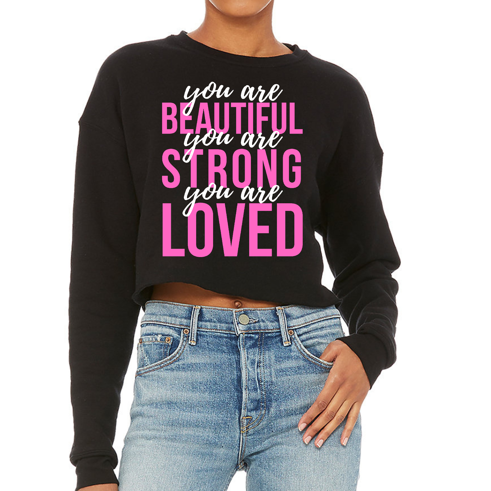 A stylish women's cropped graphic sweatshirt in pink and white, featuring the inspirational text 'You Are Beautiful Strong Loved' on the front.