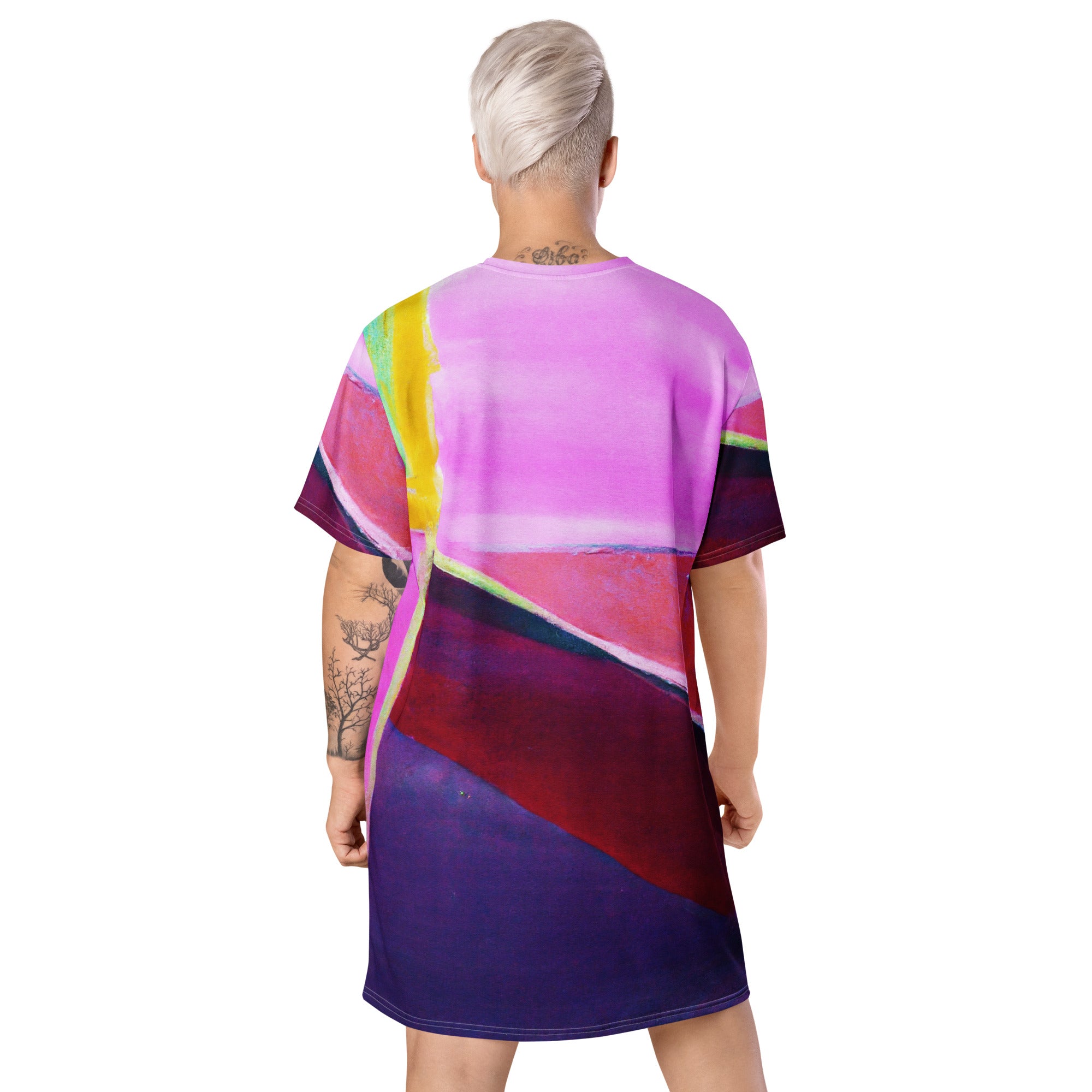 Womens Graphic T-shirt Dress featuring a vibrant pink and purple pattern, showcasing its oversized fit and stylish design.