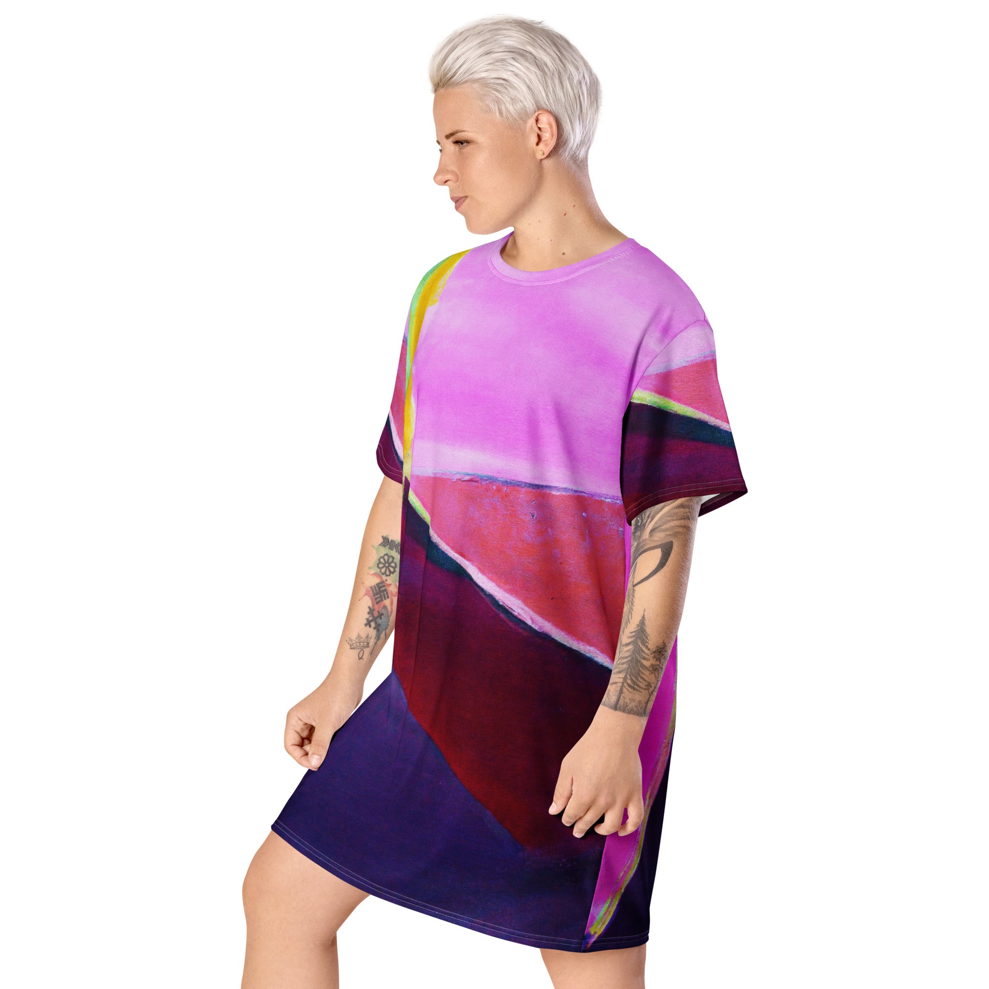 Womens Graphic T-shirt Dress featuring a vibrant pink and purple pattern, showcasing its oversized fit and stylish design.