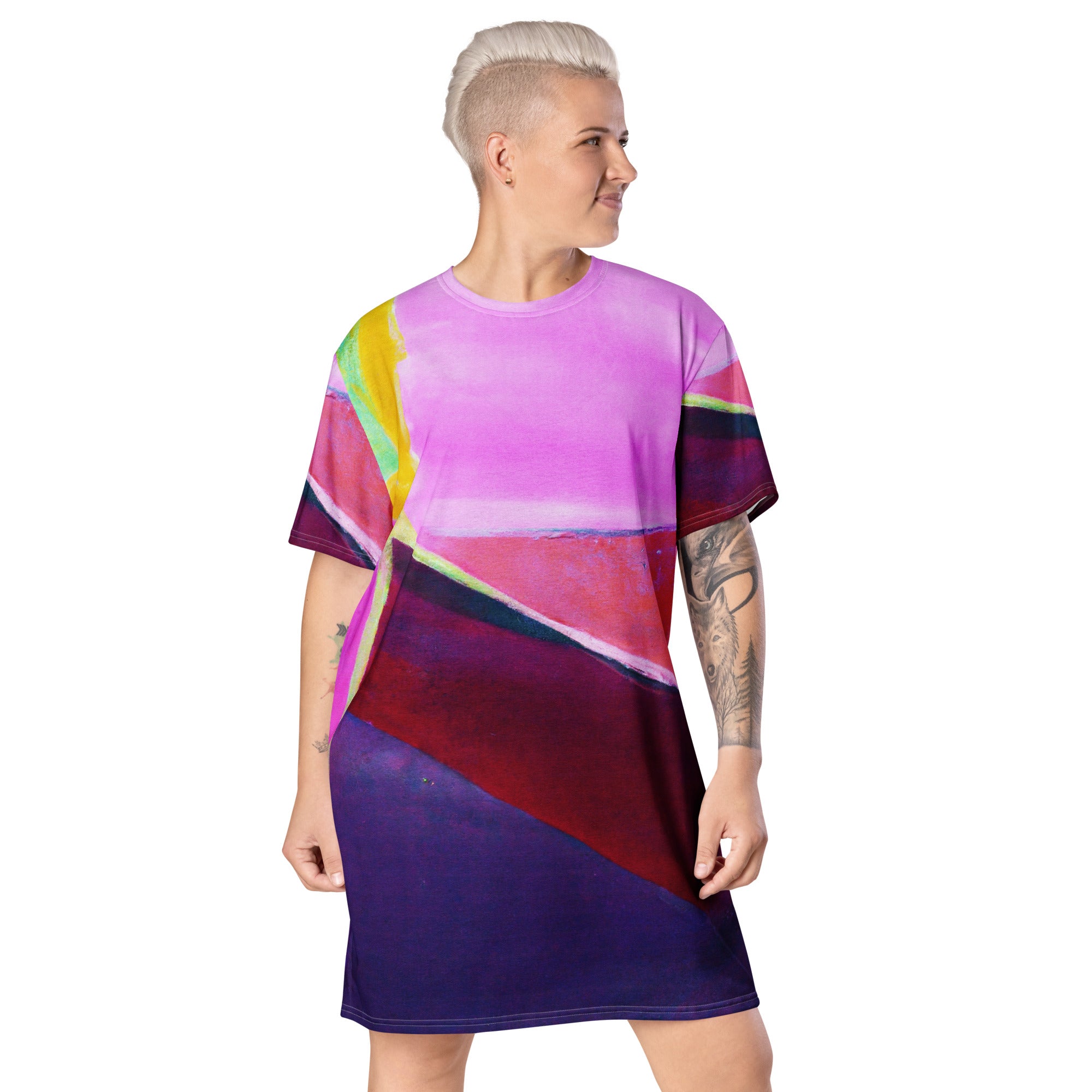 Womens Graphic T-shirt Dress featuring a vibrant pink and purple pattern, showcasing its oversized fit and stylish design.