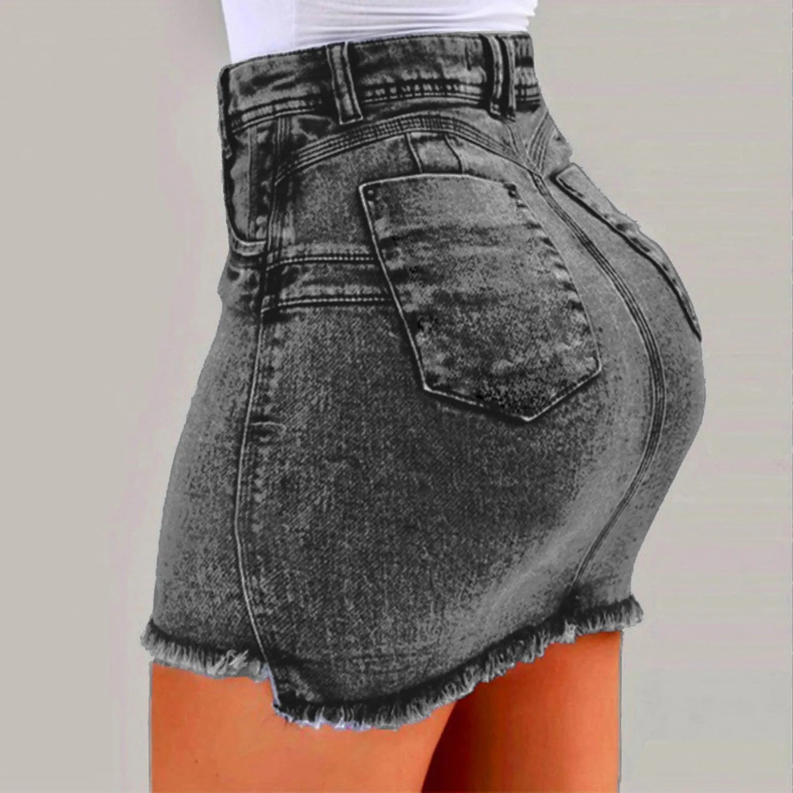 A stylish Women's High Stretch A-Line Mini Skirt in Washed Denim, showcasing its trendy design and comfortable fit.