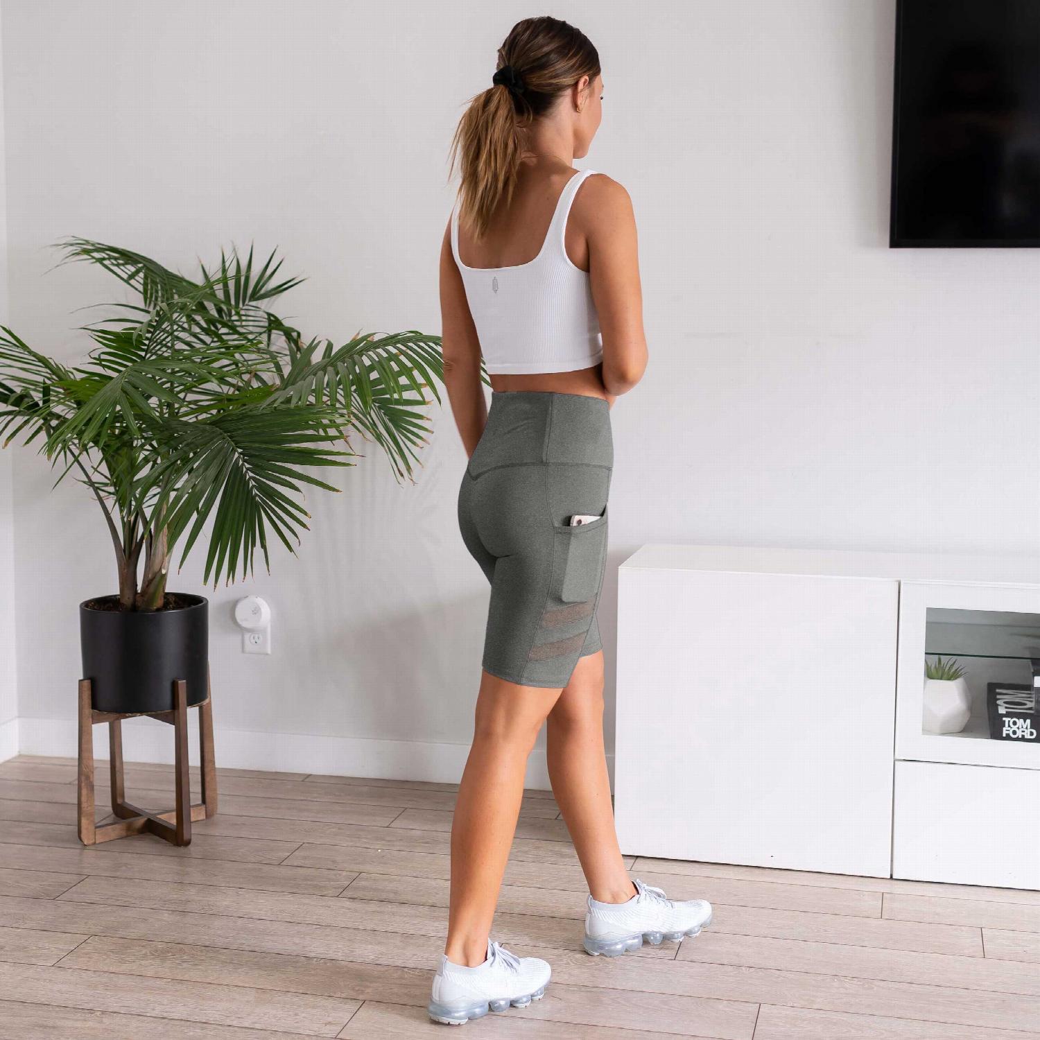 Womens High Waist Tummy Control Mesh Biker Shorts featuring a high waistband, mesh cutouts, and pockets, ideal for workouts.