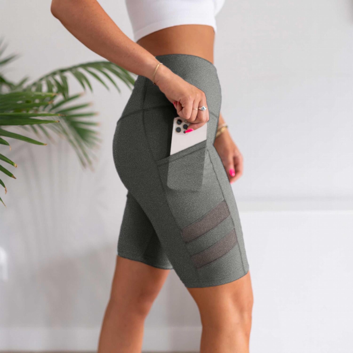 Womens High Waist Tummy Control Mesh Biker Shorts featuring a high waistband, mesh cutouts, and pockets, ideal for workouts.
