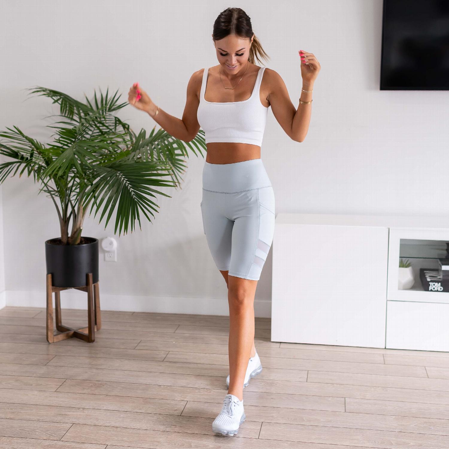 Womens High Waist Tummy Control Mesh Biker Shorts featuring a high waistband, mesh cutouts, and pockets, ideal for workouts.