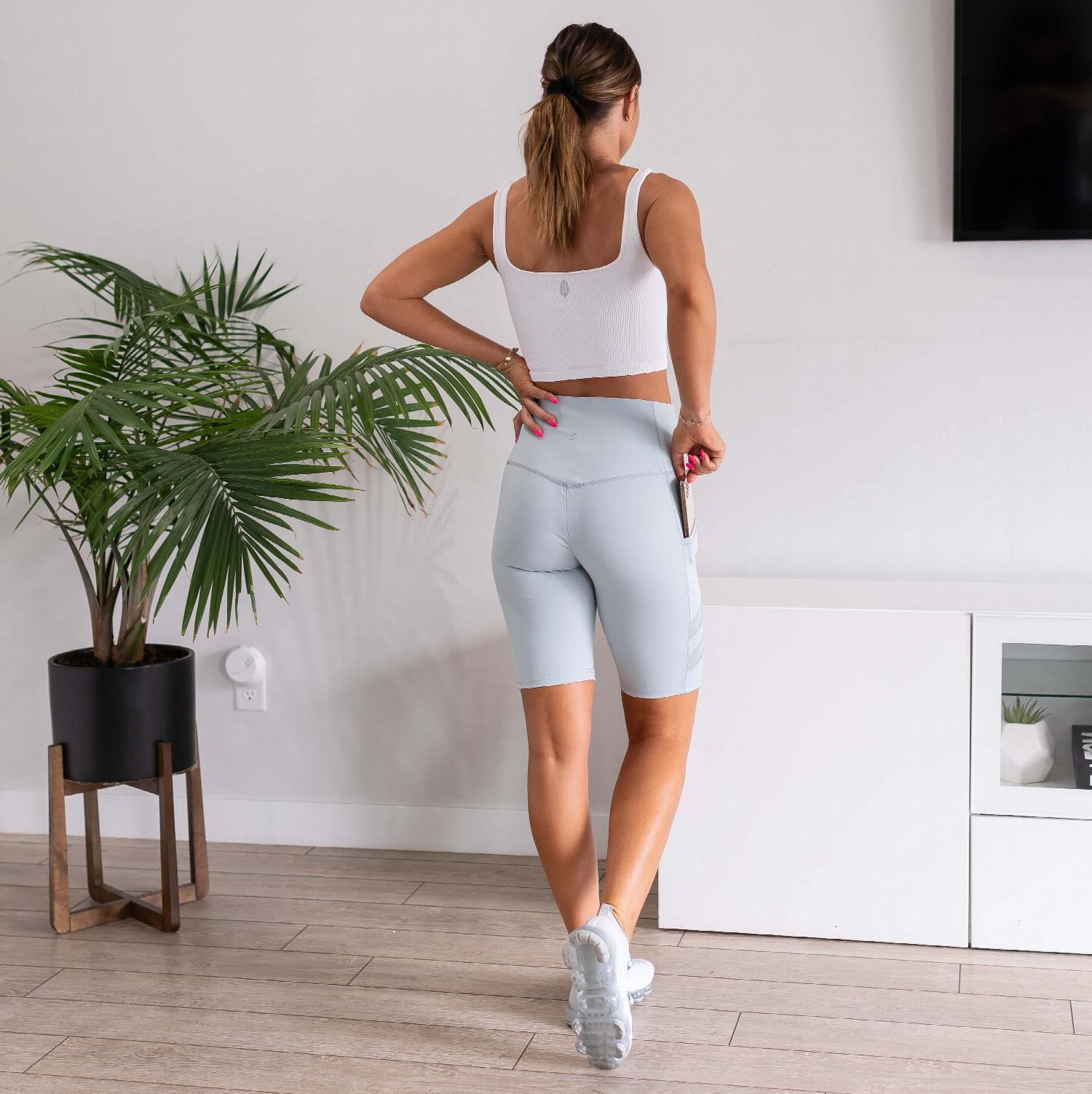 Womens High Waist Tummy Control Mesh Biker Shorts featuring a high waistband, mesh cutouts, and pockets, ideal for workouts.