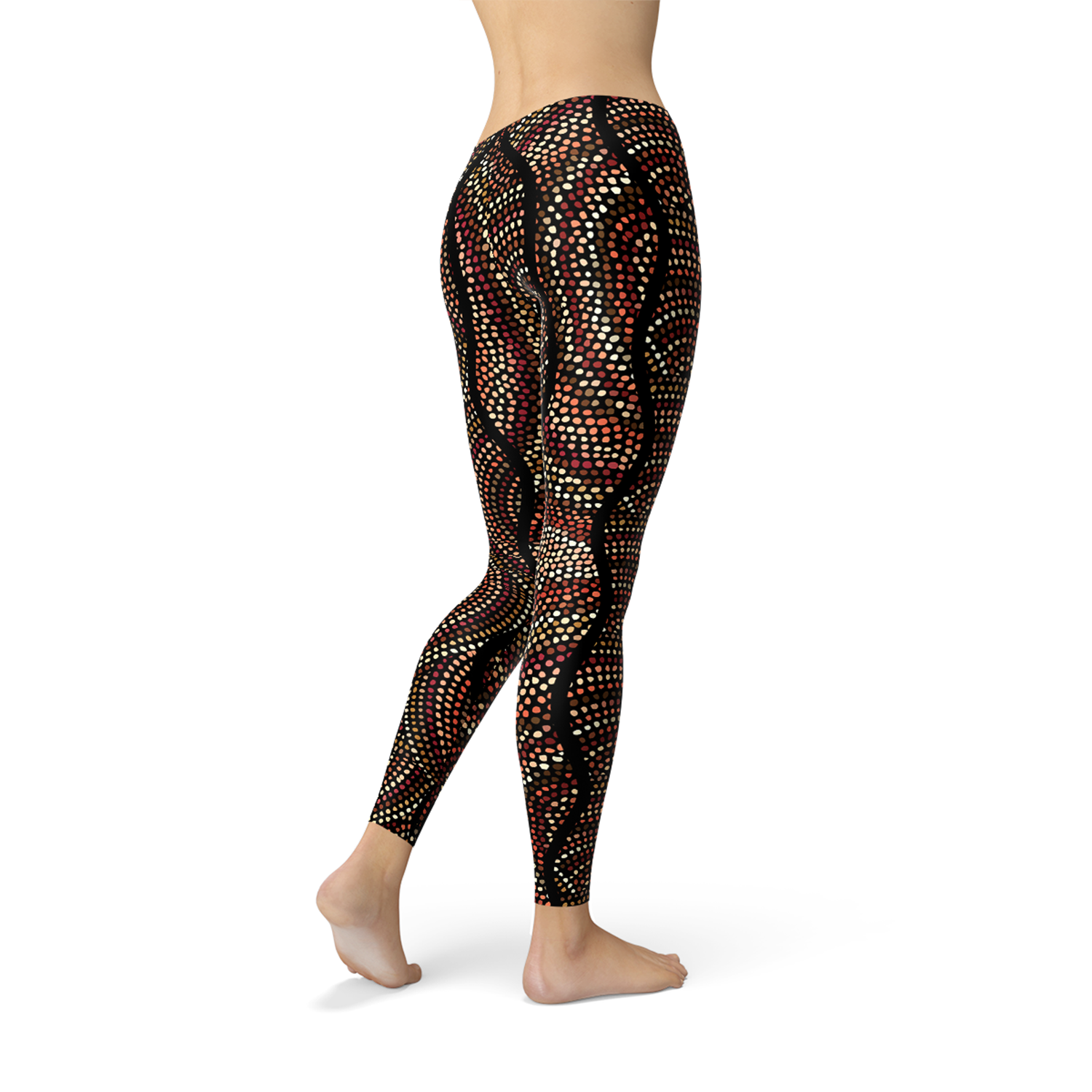 Women's leggings featuring polka dots and Aboriginal artwork inspired by Dreamtime, showcasing vibrant colors and a comfortable fit.