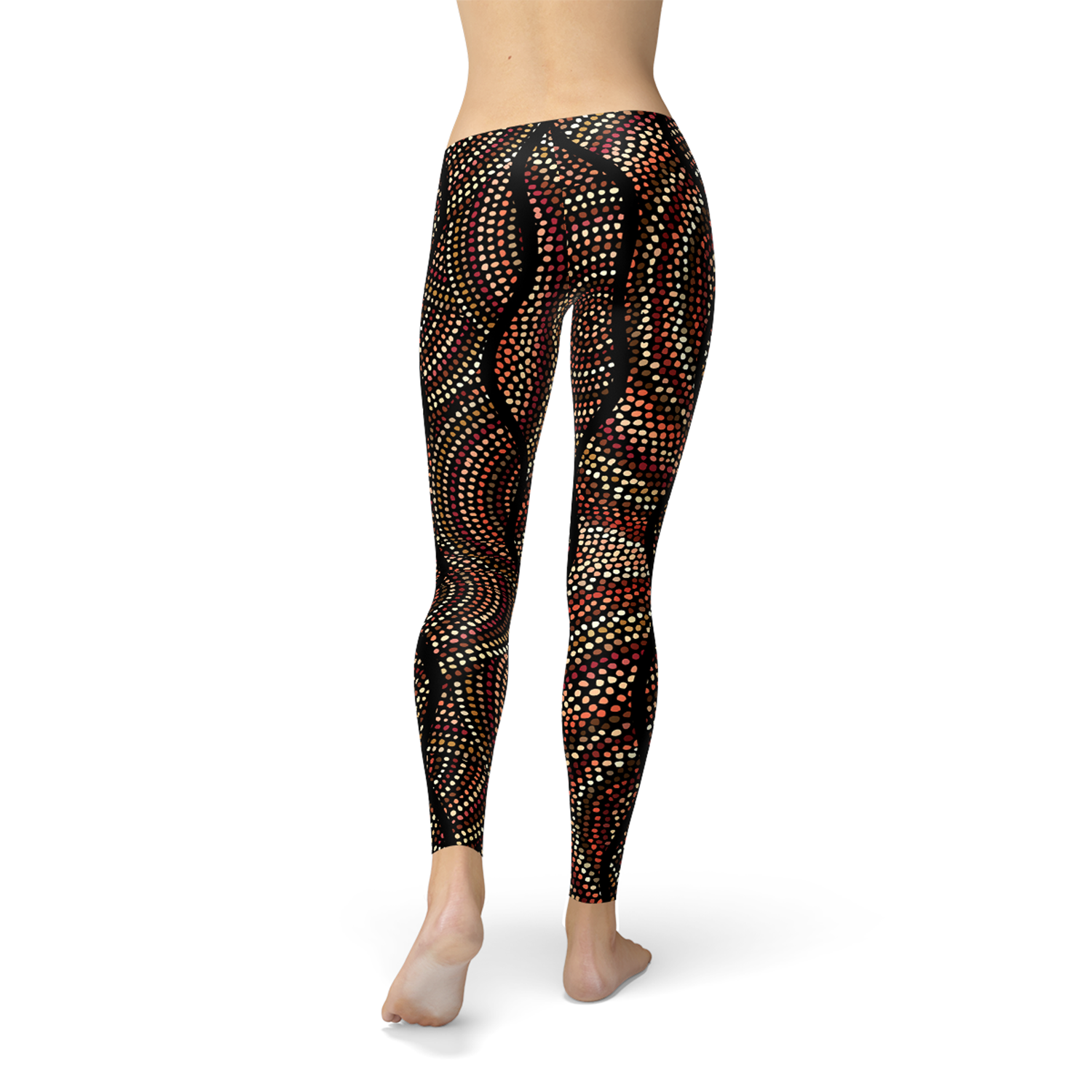 Women's leggings featuring polka dots and Aboriginal artwork inspired by Dreamtime, showcasing vibrant colors and a comfortable fit.