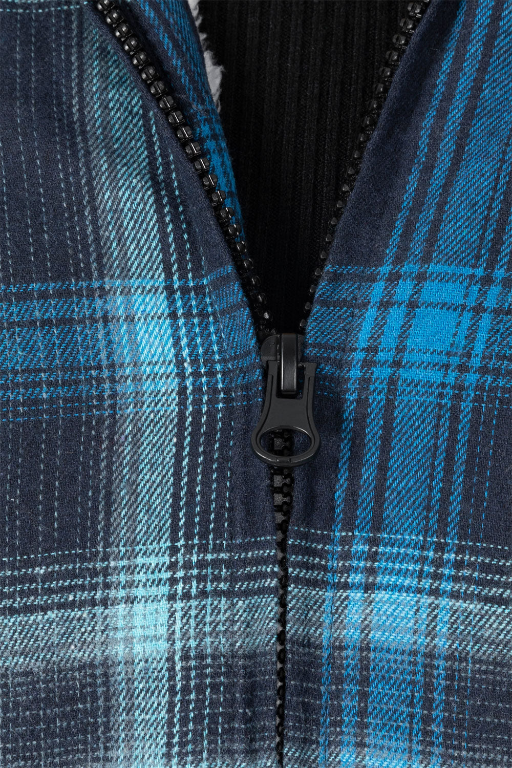 Women's sherpa-lined flannel jacket with a full zip-up design, featuring a hood and plaid pattern, perfect for chilly weather.