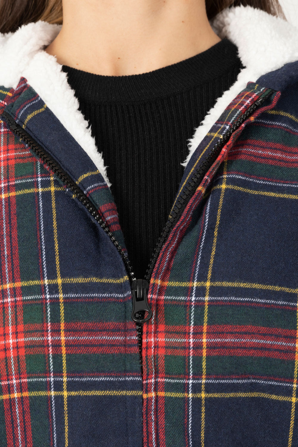 Women's sherpa-lined flannel jacket with a full zip-up design, featuring a hood and plaid pattern, perfect for chilly weather.