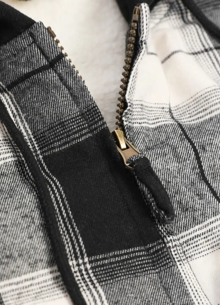 Women's Sherpa-Lined Full Zip Up Flannel Jacket with Fleece Hood, showcasing its stylish design and warm lining.