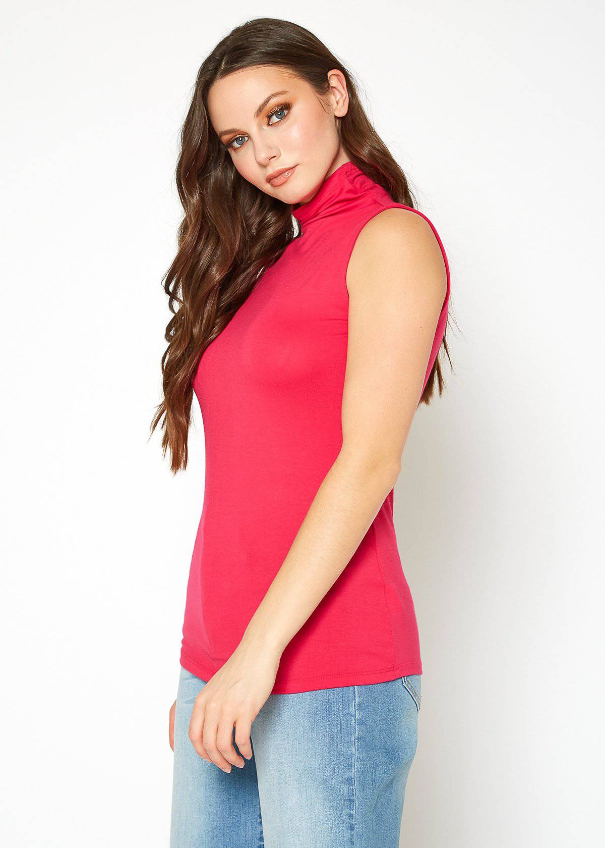 A stylish Women's Sleeveless Turtle Neck Fitted Top in a soft fabric, perfect for layering in fall and winter.