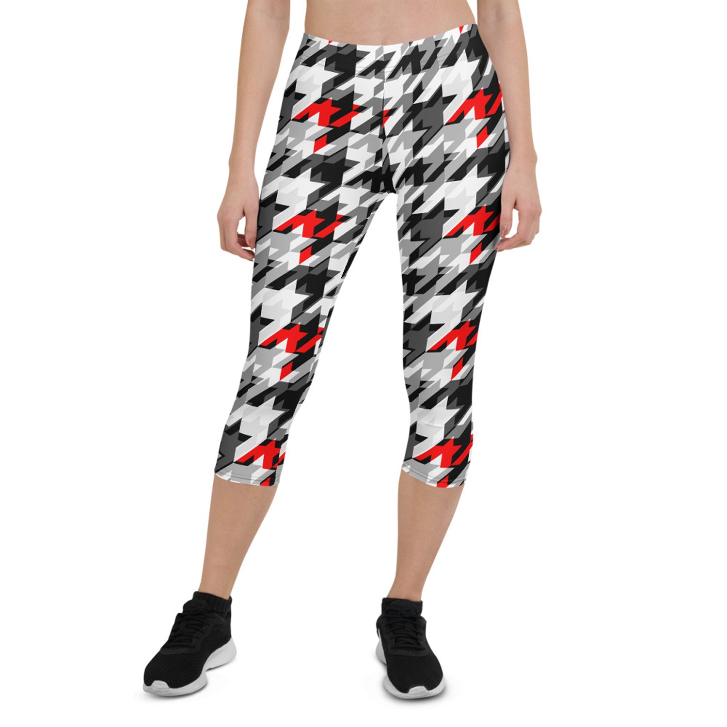 Women's Sports Houndstooth Capri Leggings featuring a stylish houndstooth pattern, designed for comfort and performance during workouts.