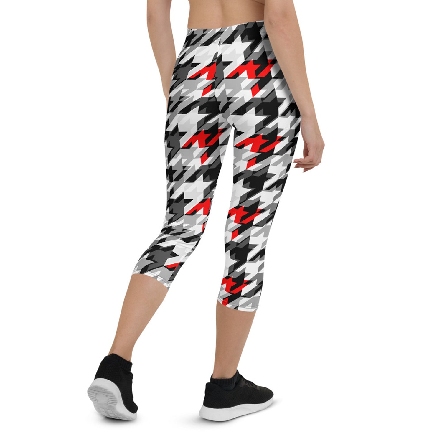 Women's Sports Houndstooth Capri Leggings featuring a stylish houndstooth pattern, designed for comfort and performance during workouts.
