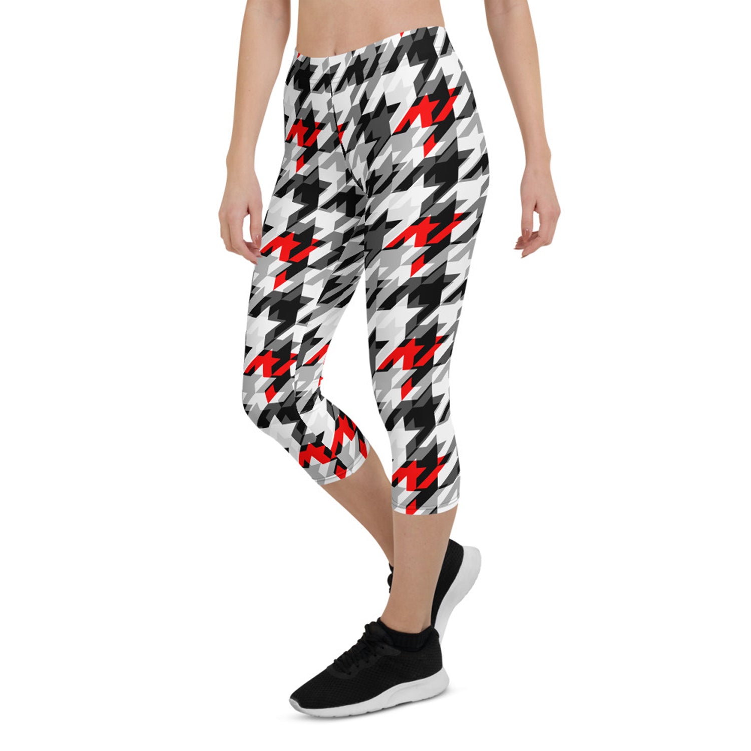 Women's Sports Houndstooth Capri Leggings featuring a stylish houndstooth pattern, designed for comfort and performance during workouts.