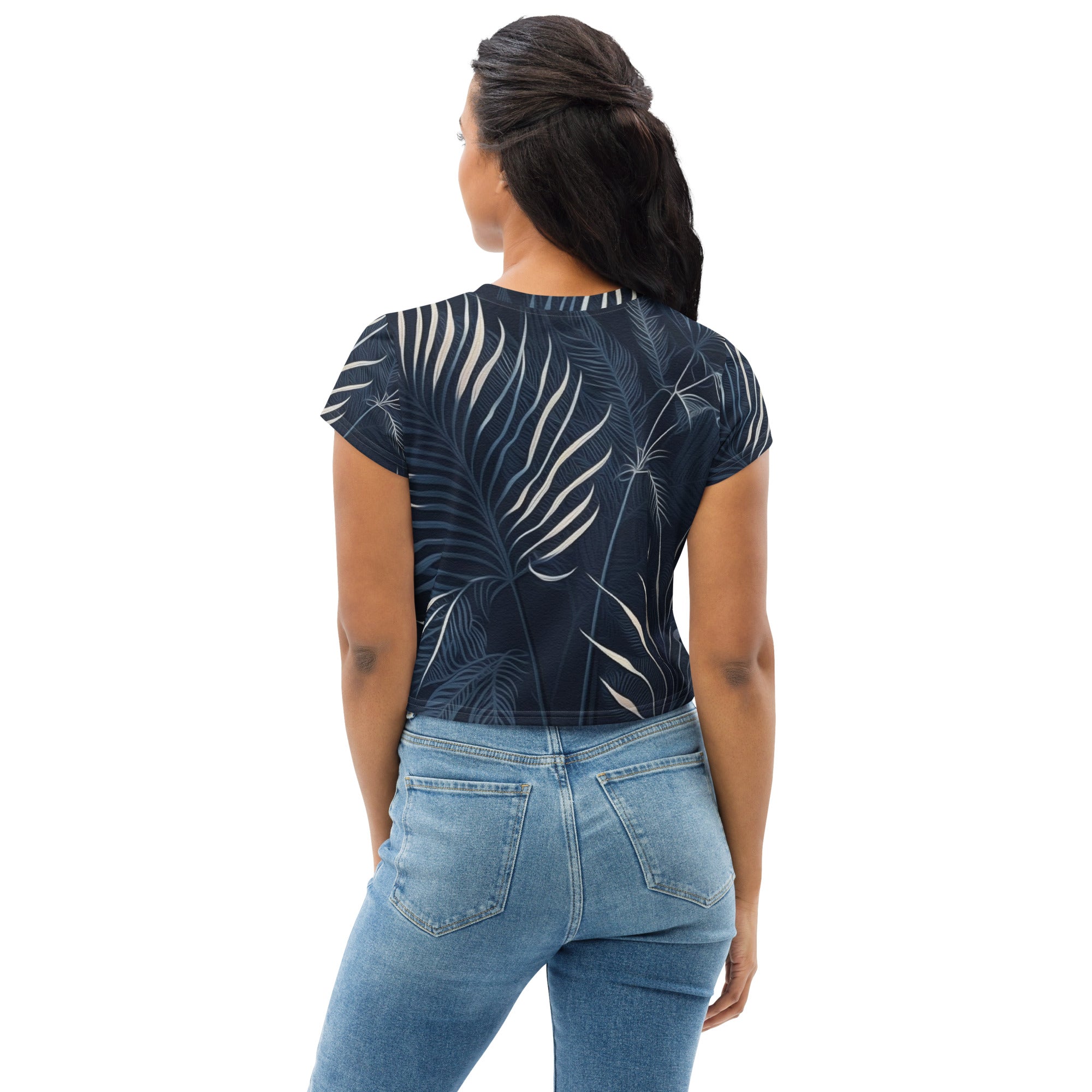 Women's Stretch Fit Crop Tee in Blue White Palm Leaves, showcasing a stylish design with a cropped silhouette and short sleeves.