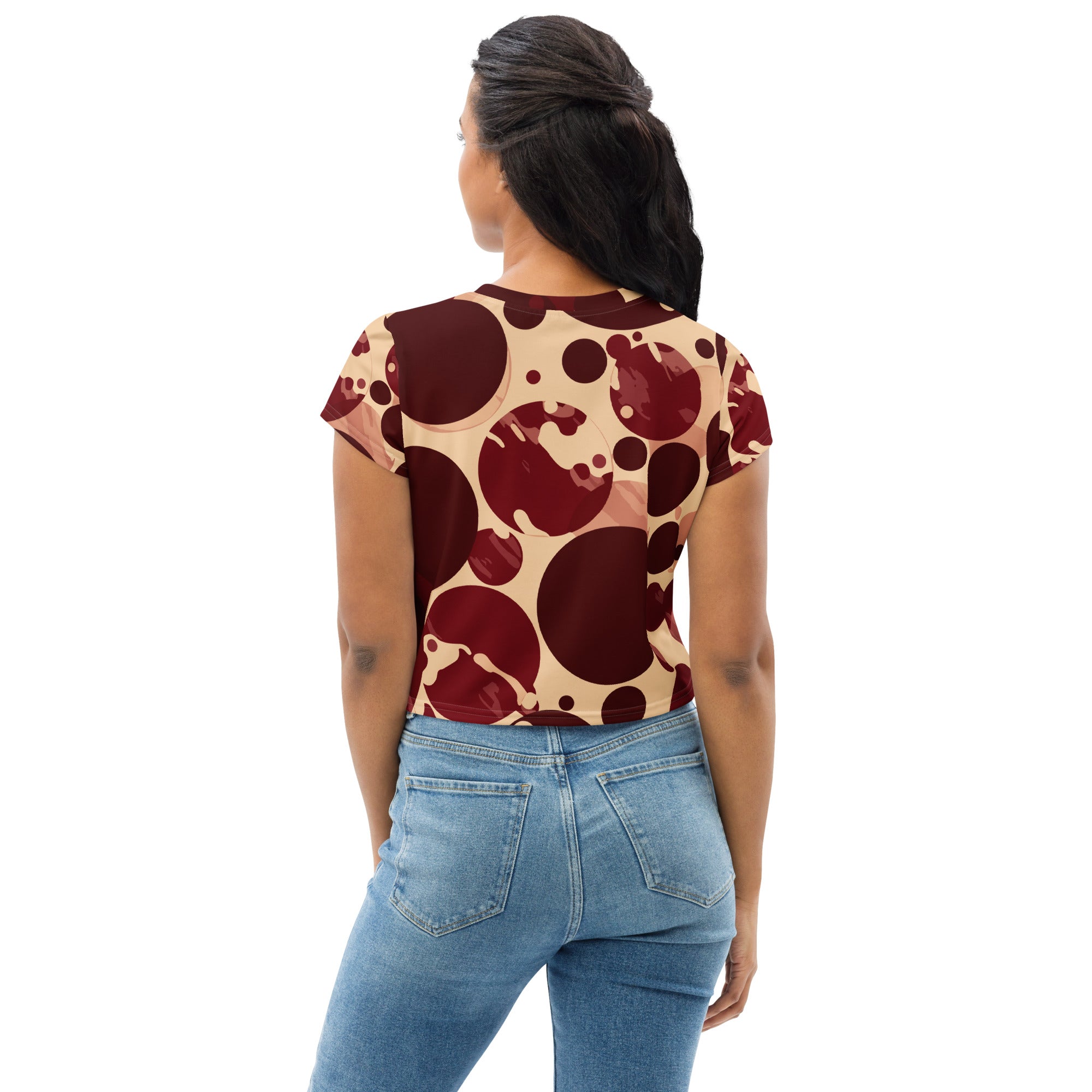 Women's Stretch Fit Crop Tee in Burgundy with Beige Circular Print, showcasing its stylish design and comfortable fit.