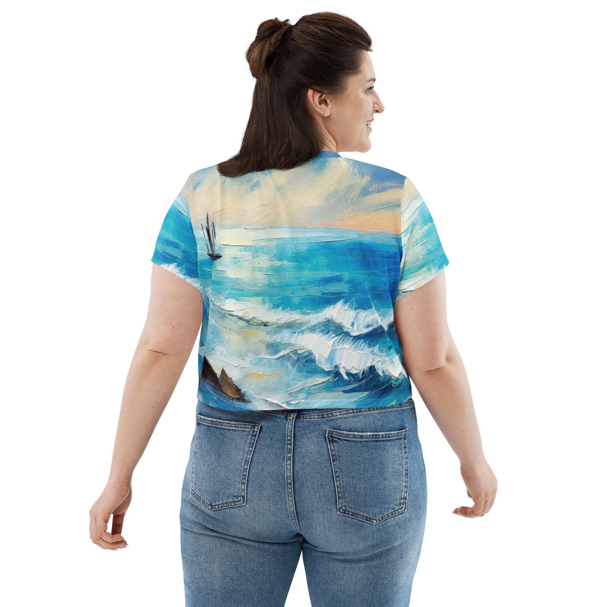 Womens Stretch Fit Crop Tee in Blue Ocean Print, showcasing a stylish cropped design with a vibrant ocean-themed pattern.