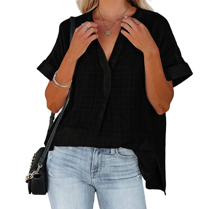 A stylish Women's V-Neck Short Sleeve Solid Color Thin Loose Check Shirt displayed on a mannequin, showcasing its elegant design and comfortable fit.