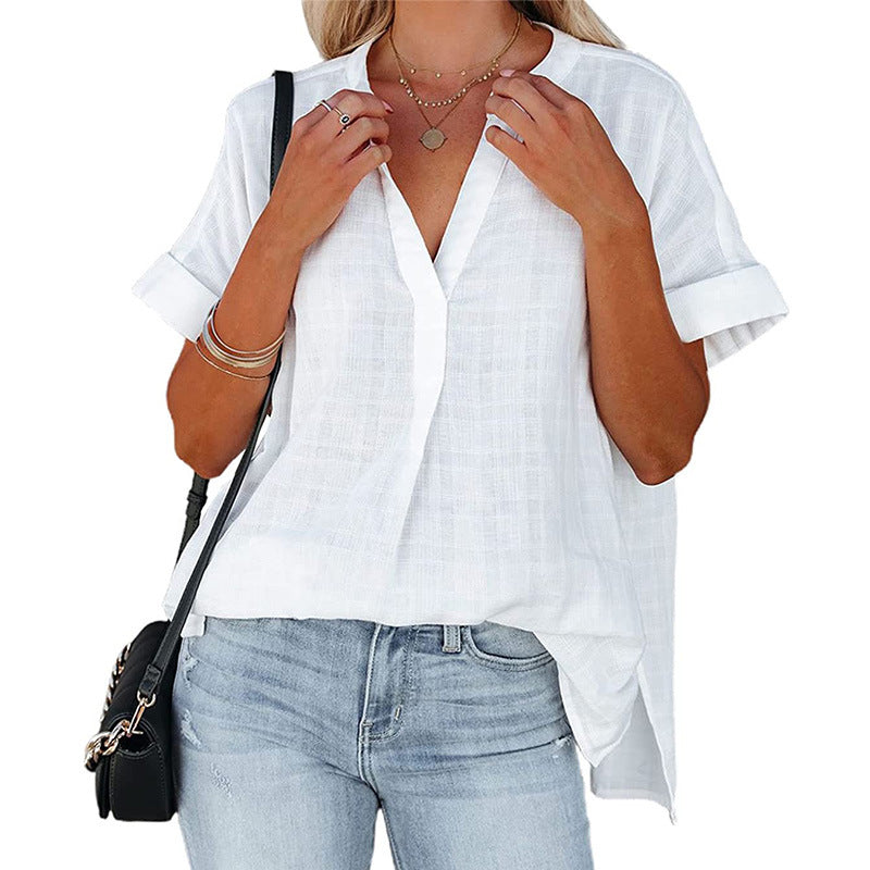 A stylish Women's V-Neck Short Sleeve Solid Color Thin Loose Check Shirt displayed on a mannequin, showcasing its elegant design and comfortable fit.