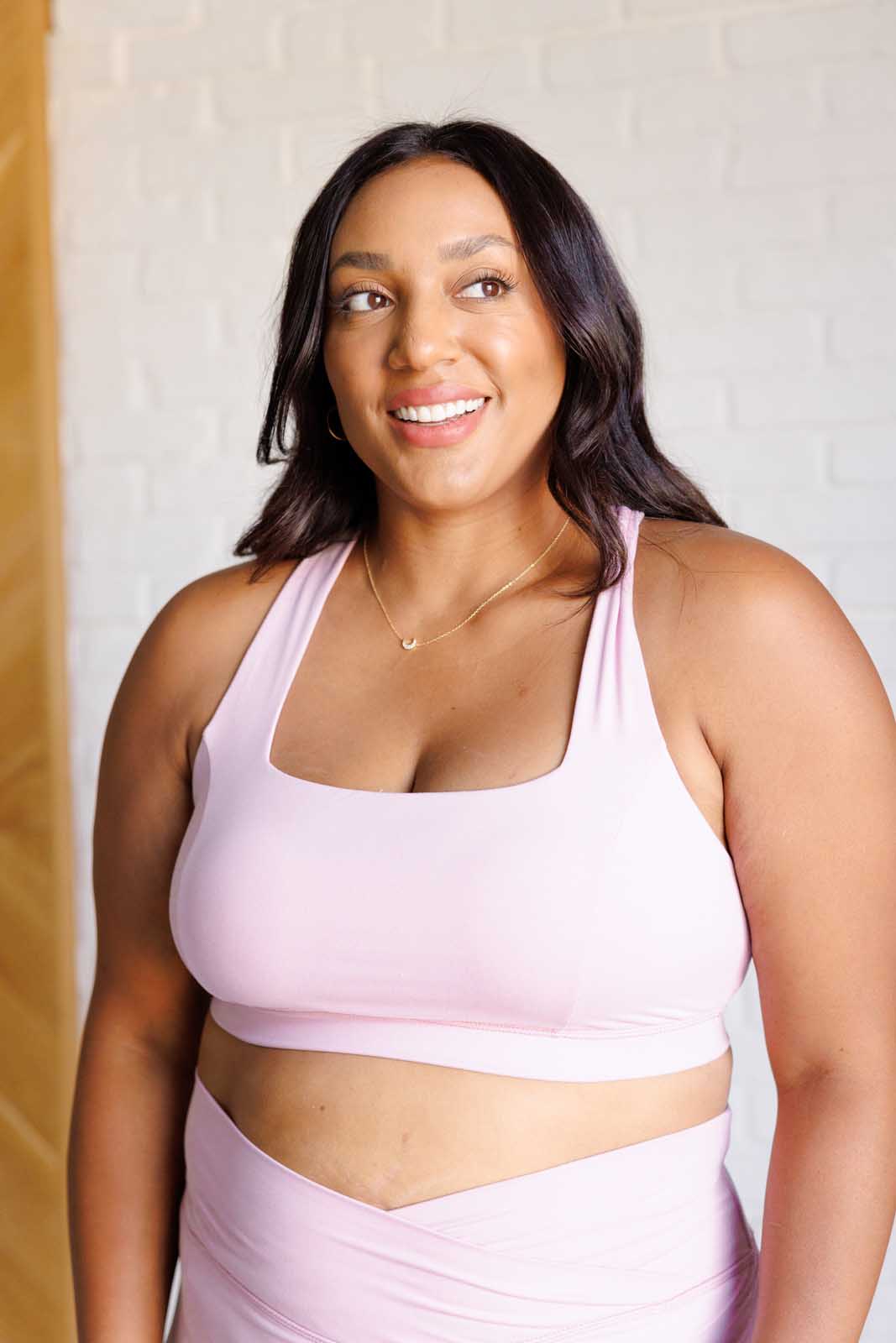 Mauve Peony Cross Back Sports Bra featuring a square neckline and back cutout, made from brushed microfiber with removable cups.