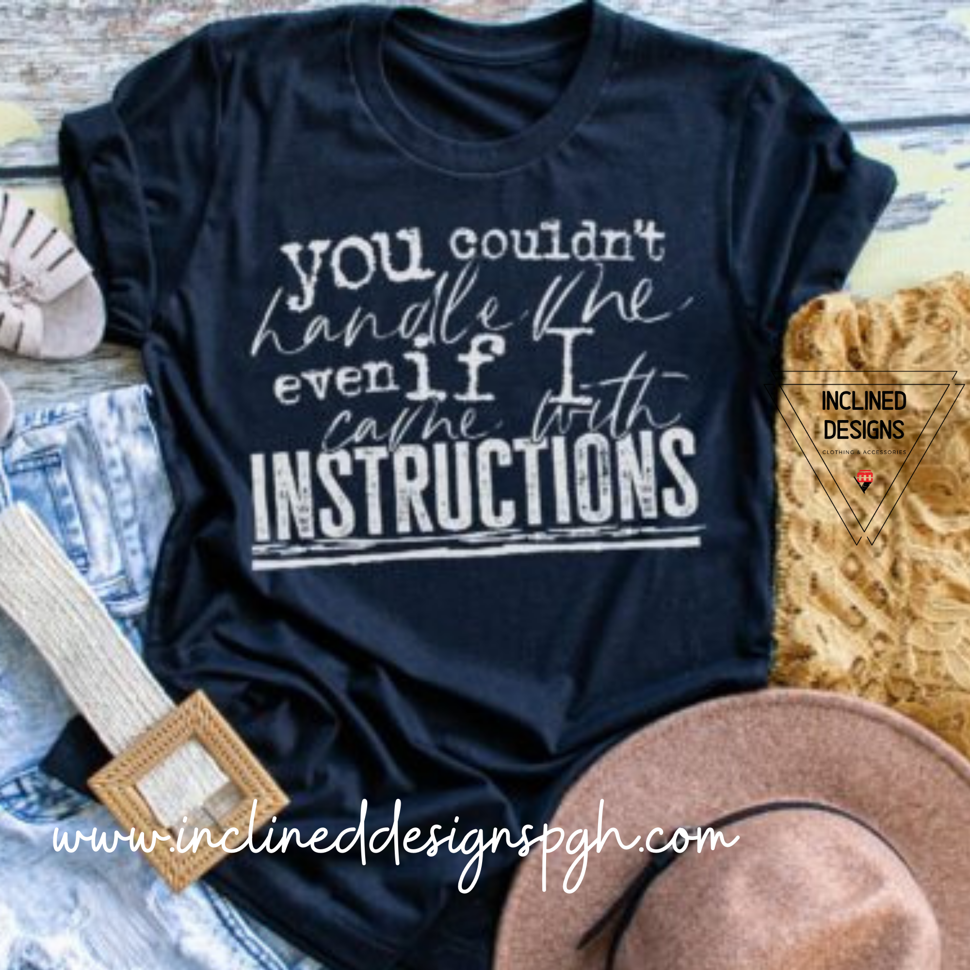 A stylish adult tee featuring the phrase 'You Couldn't Handle Me Even If I Had Instructions' in bold screen print on a soft poly cotton triblend fabric.