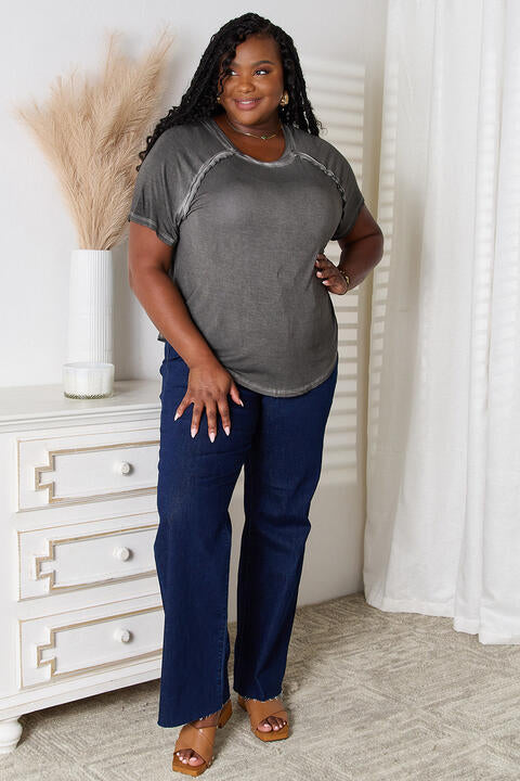 Zenana Full Size Round Neck Raglan Sleeve T-Shirt in various colors, showcasing the round neckline and raglan sleeves.