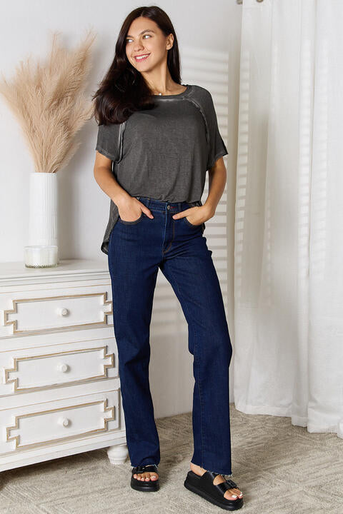 Zenana Full Size Round Neck Raglan Sleeve T-Shirt in various colors, showcasing the round neckline and raglan sleeves.