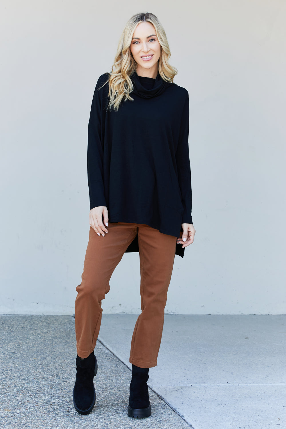 Zenana Full Size Slit High-Low Funnel Neck Top in Black, featuring a stylish slit design and cozy funnel neck, perfect for casual wear.