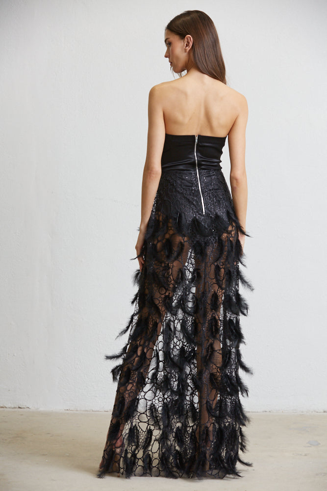 The Zoey Dress showcasing luxurious satin fabric, intricate bead detailing, and a thigh-high slit, perfect for special occasions.