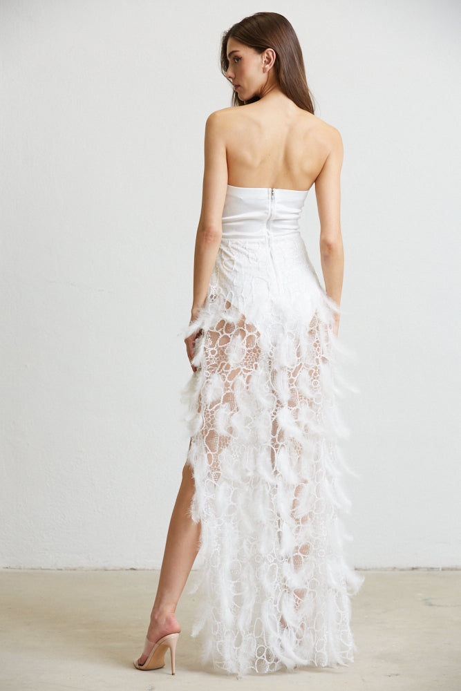 The Zoey Dress showcasing luxurious satin fabric, intricate bead detailing, and a thigh-high slit, perfect for special occasions.